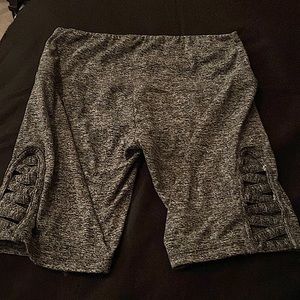 Grey legging shorts with zig zag opening on sides